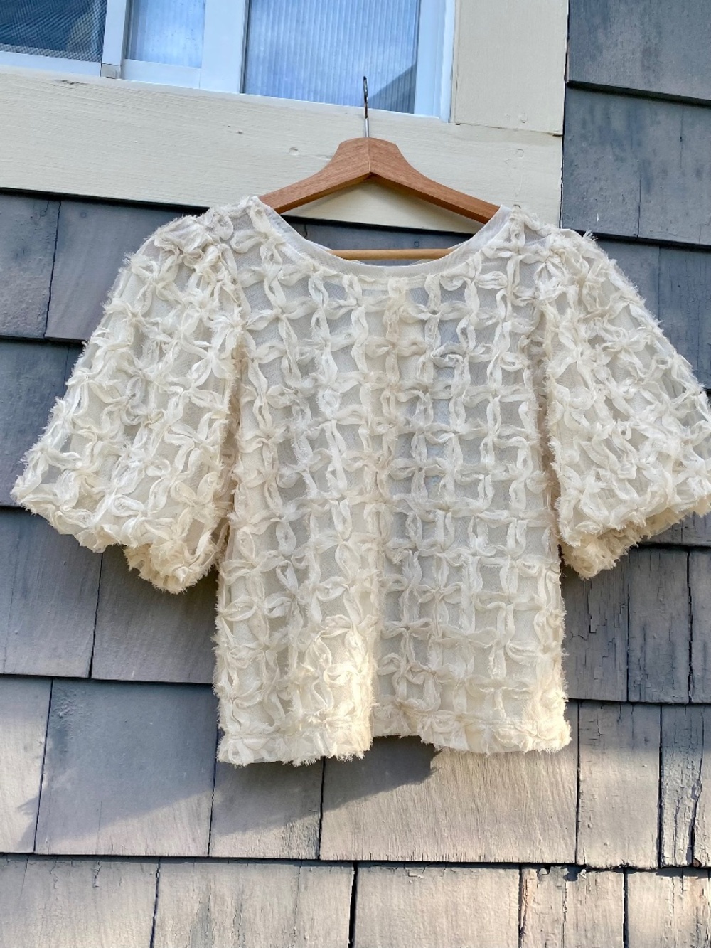 Anthropologie textured bow back blouse